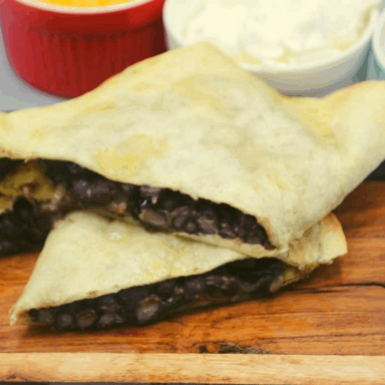 Crispy air fryer black bean quesadillas filled with black beans and melted cheese