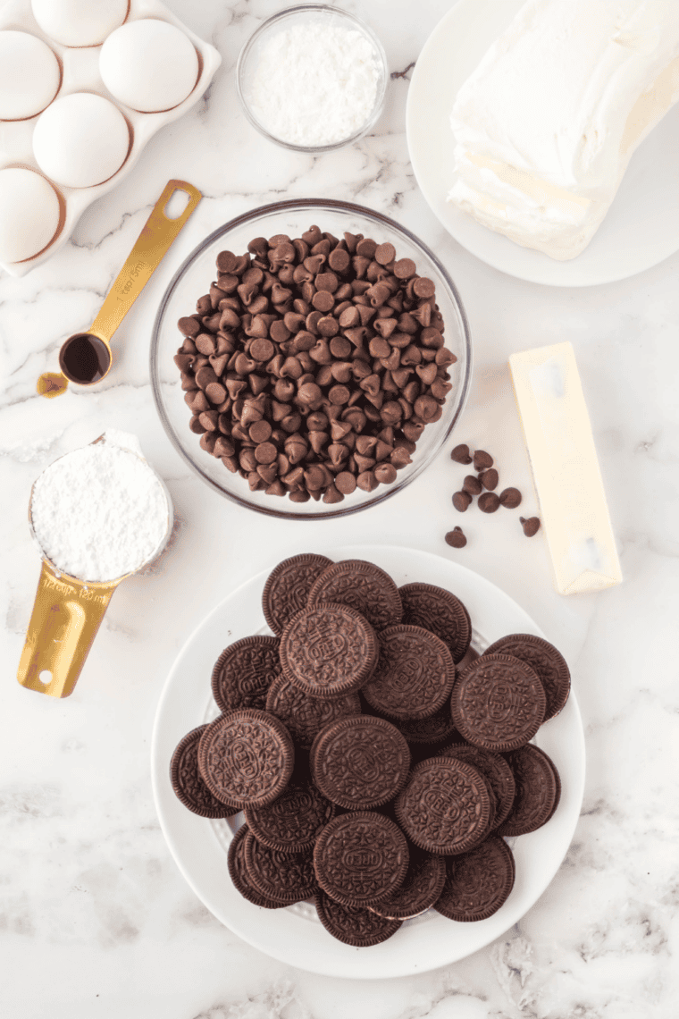 Ingredients needed for Easy Air Fryer Chocolate Cheesecake on kitchen table.