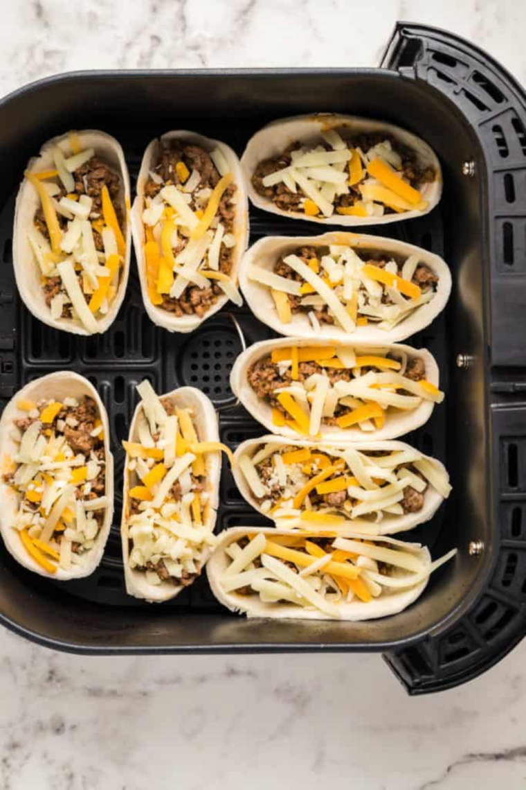  Air fryer preheating to 390&deg;F to make crispy mini taco boats  