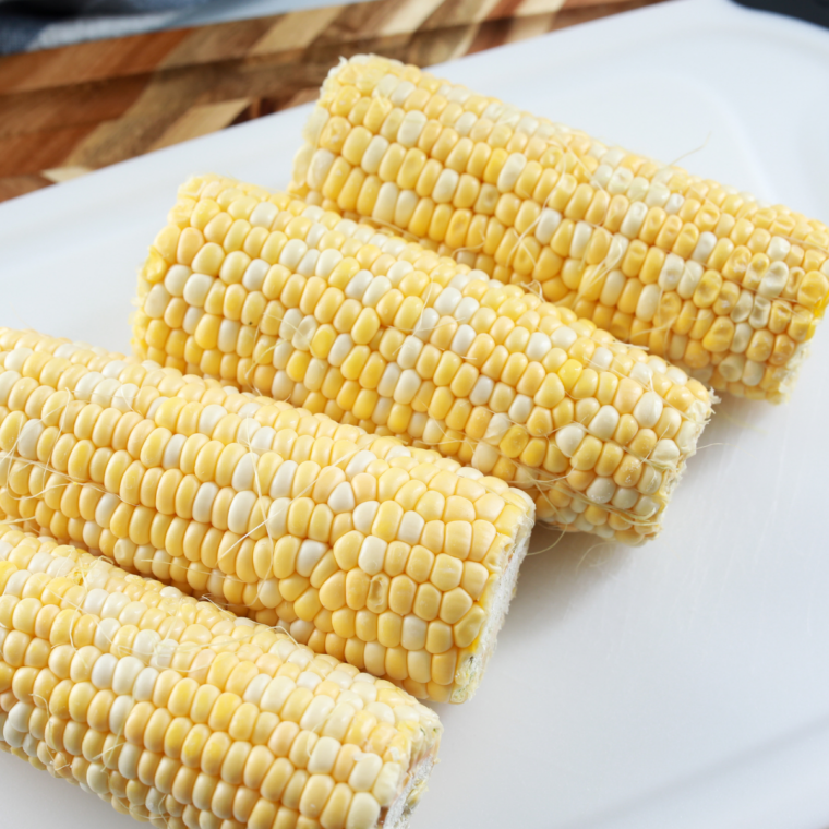 Ingredients needed for Blackstone Grilled Corn on the Cob (Easy + Buttery!) on kitchen counter.