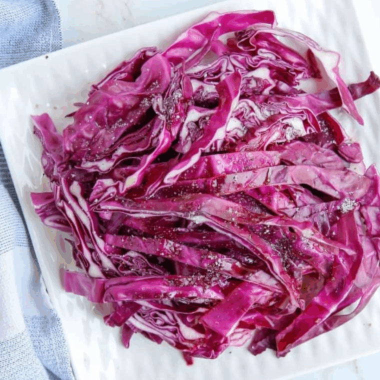 Ingredients needed for Crispy Air Fryer Red Cabbage Recipe on kitchen table.
