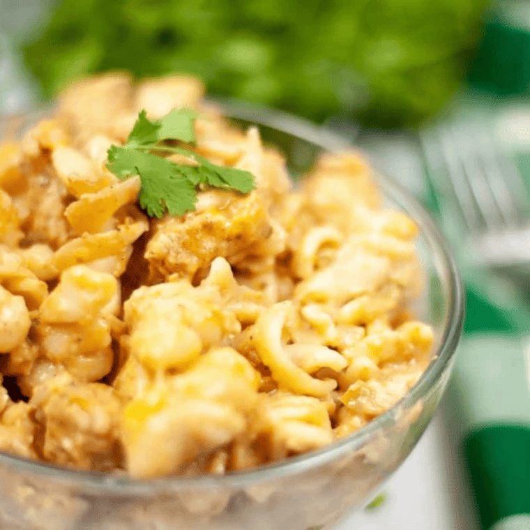 Creamy Instant Pot Chicken Fajita Pasta with sliced chicken, bell peppers, and pasta coated in a rich, seasoned sauce.