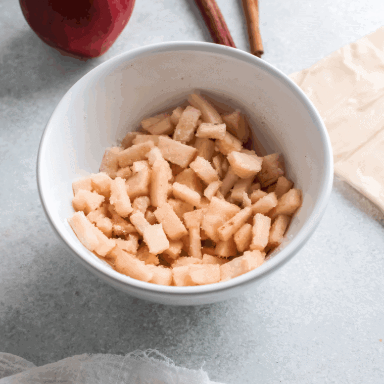 Mix the apple, ground cinnamon, brown sugar, nutmeg lemon juice, and cornstarch together in a small mixing bowl.