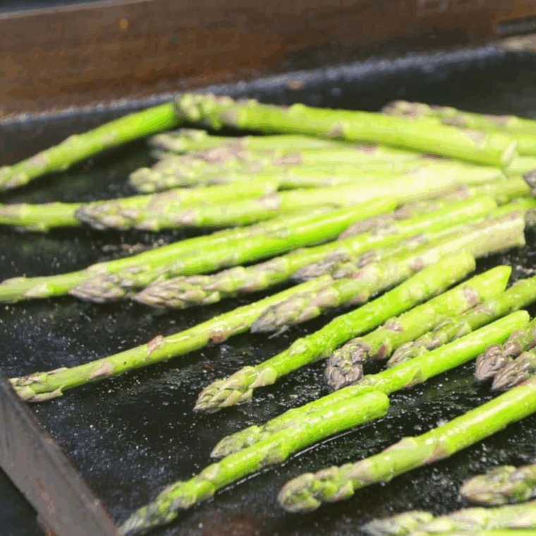 Season the asparagus with seasonings and cook until tender.