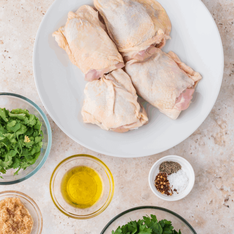 Ingredients needed for Easy Air Fryer Pollo Asado Chicken on kitchen table.