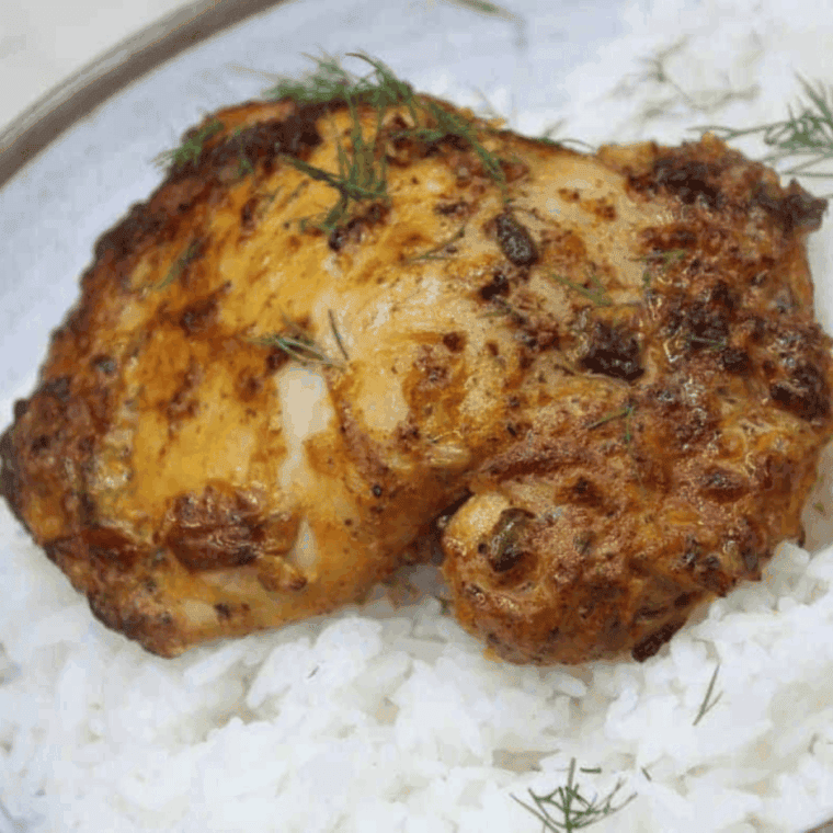 Air fryer Pollo Asado chicken breasts seasoned with spices and citrus, cooked to golden perfection.