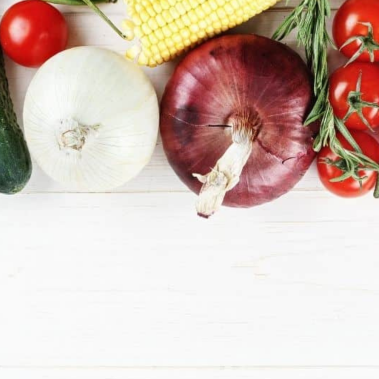 Ingredients needed for Easy Blackstone Griddle Vegetable Skewers on kitchen table.