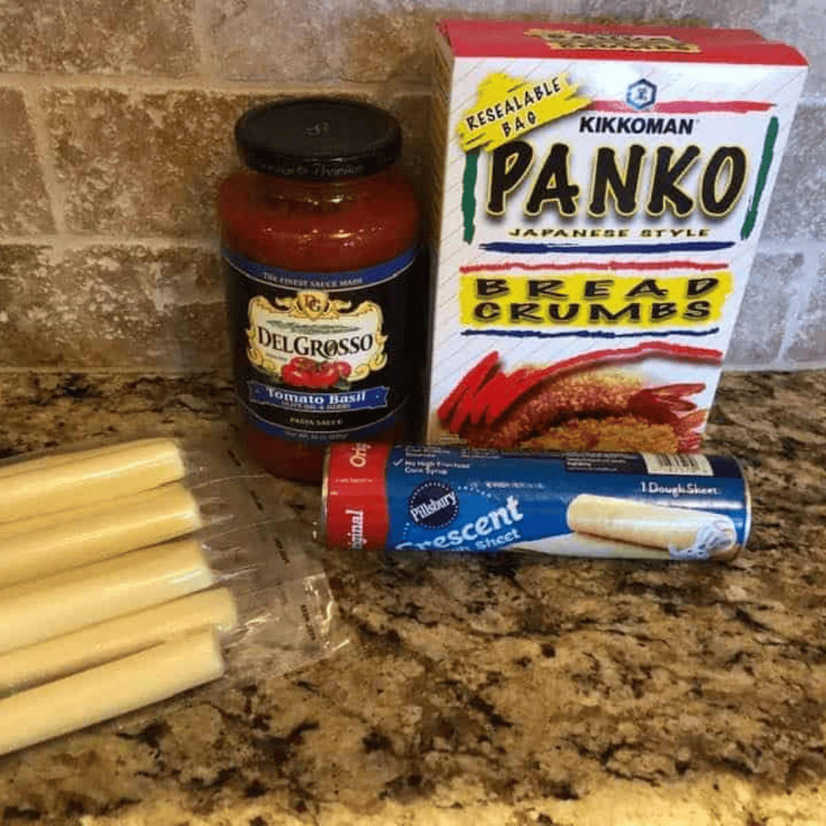 Ingredients needed for 4 Ingredients Air Fryer Mozzarella Bites on kitchen table.