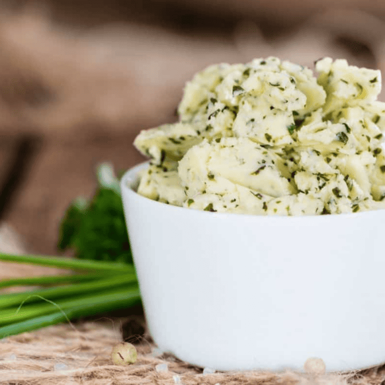 Herb butter mixture combined, shaped into a log using plastic wrap, and chilled in refrigerator until firm for stuffing chicken.