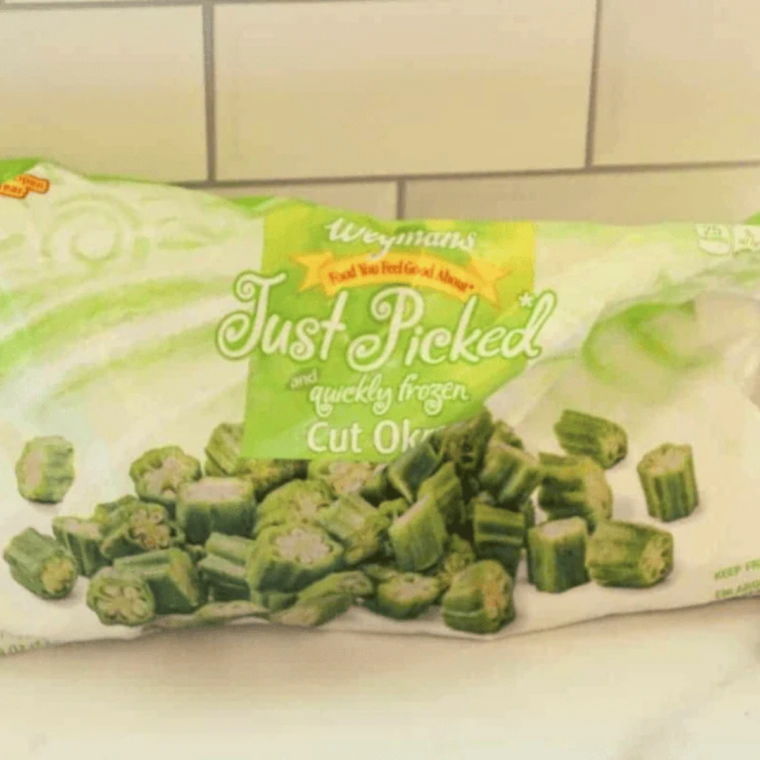 Bag of frozen cut okra on a counter before air frying