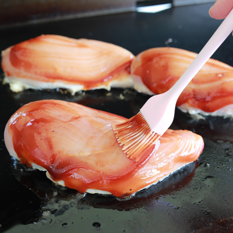 Preheat the Blackstone: Blackstone griddle heating to medium temperature with a light coating of oil spread across the cooking surface.