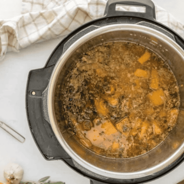 Instant Pot lid locked with the valve set to sealing for butternut squash soup