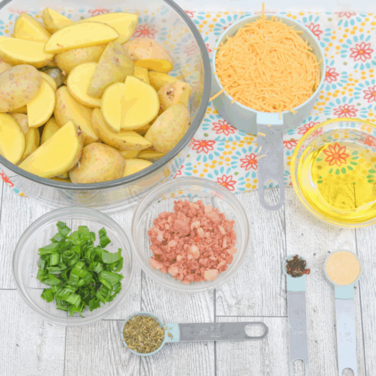 Ingredients needed for Easy Air Fryer Loaded Baby Potatoes (Extra Crispy and Ready in 20 Minutes!) on kitchen table.