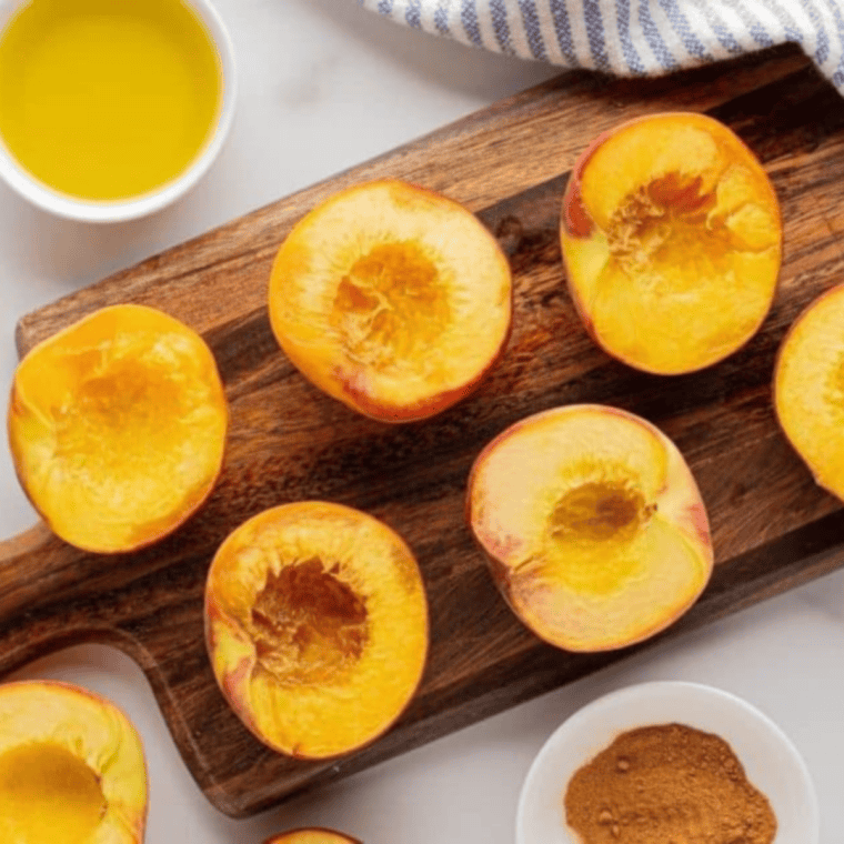 Mixing butter, sugar, and cinnamon in a bowl while air fryer preheats to 350 degrees.