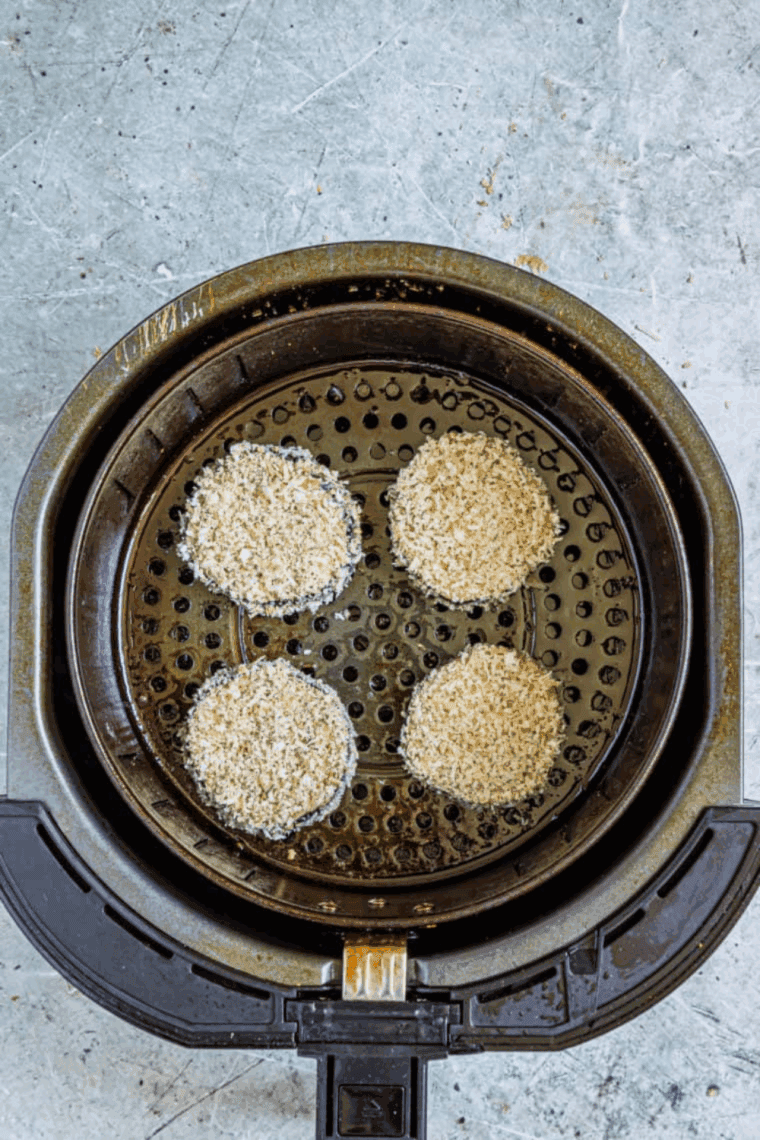 Place the eggplant into the air fryer basket and cook until crispy.