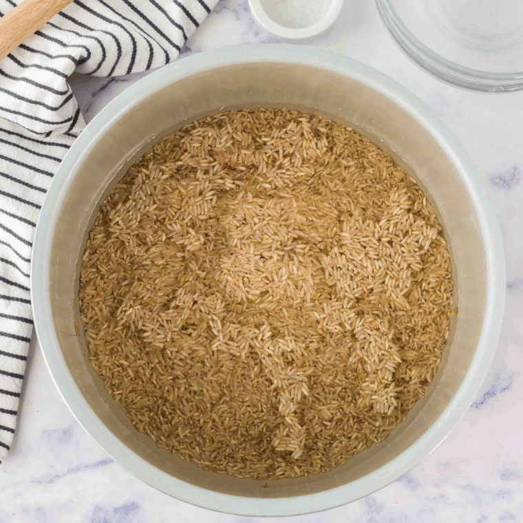 Saut&eacute;ing diced onions in olive oil in the Instant Pot until soft and translucent.
