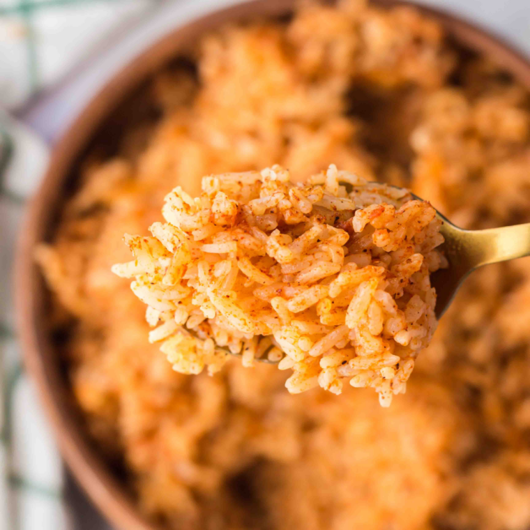Spanish rice made in Instant Pot with seasoned tomato base cooked until tender fluffy and perfect for tacos or sides