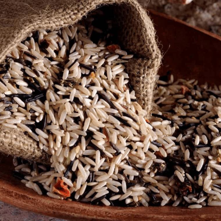 Ingredients needed for Instant Pot Wild Rice on kitchen table.