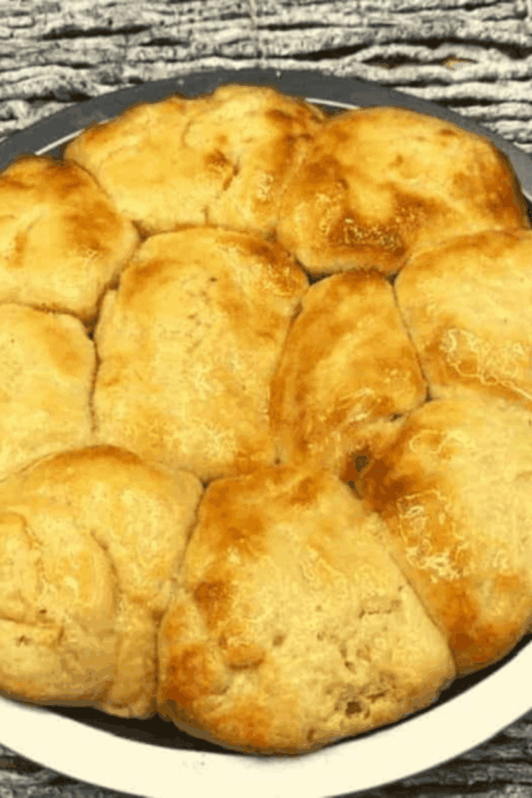 golden brown Parker House rolls (Sister Schubert Style) served in a basket
