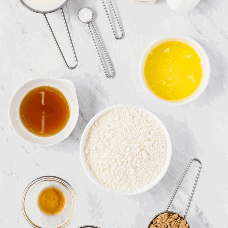 Ingredients needed for Air Fryer Maple Frosted Donuts on kitchen table.