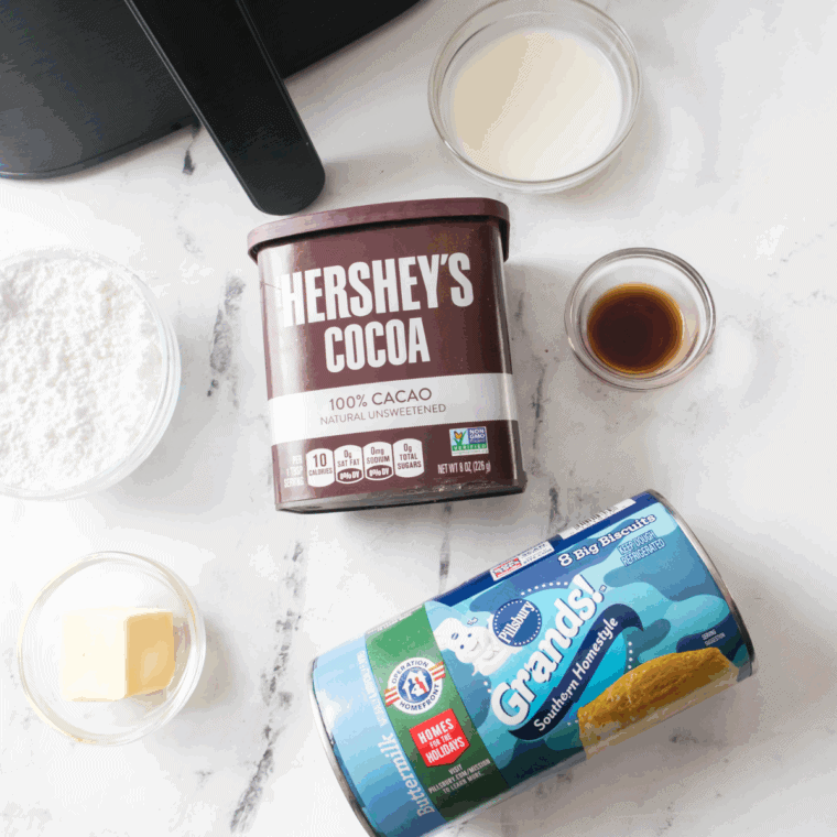 Ingredients needed for Air Fryer Nutella Donuts on kitchen table.