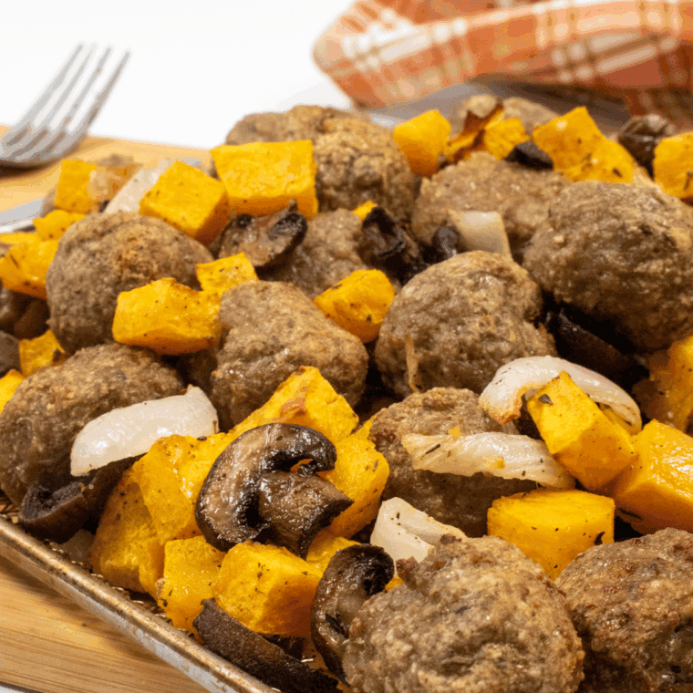 Close up of Air Fryer Turkey Sausage Meatballs and Squash on kitchen table.