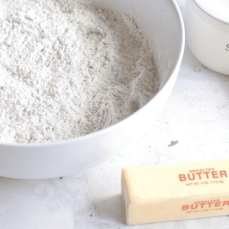 Ingredients needed for Air Fryer Homemade Kourabiedes (Greek Sugar Cookies) on kitchen table.