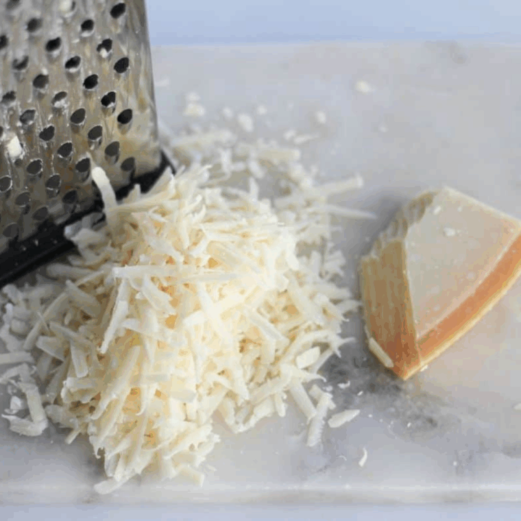 Grating the cheese.