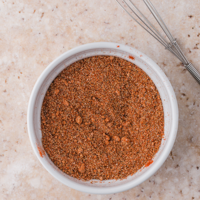 Smoky dry rub for copycat Mission BBQ pulled pork mixed in a small bowl