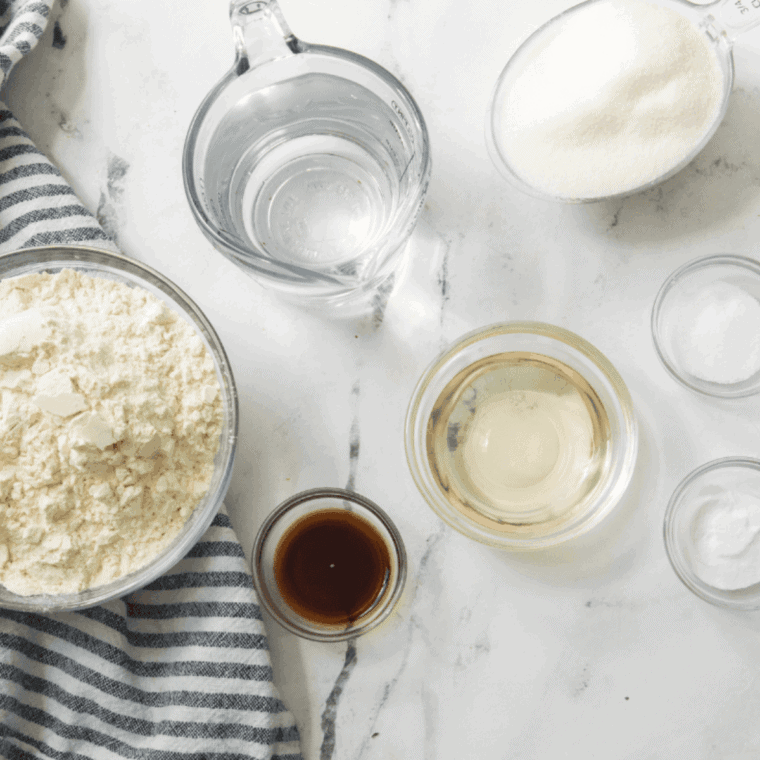 Ingredients needed for Easy Air Fryer Blueberry Cobbler Recipe on kitchen table.