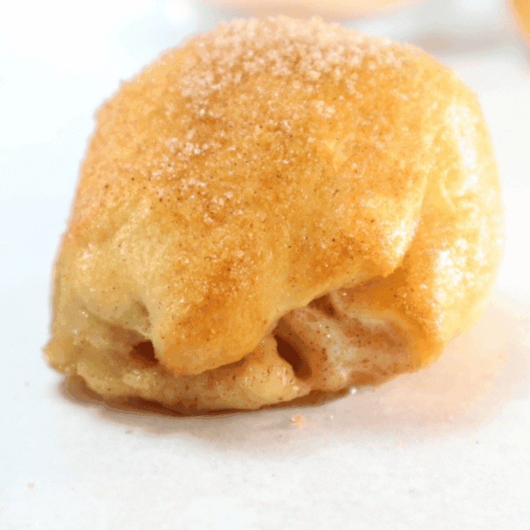 Air fryer Hocus Pocus buns made with crescent dough, cinnamon sugar, and marshmallow centers