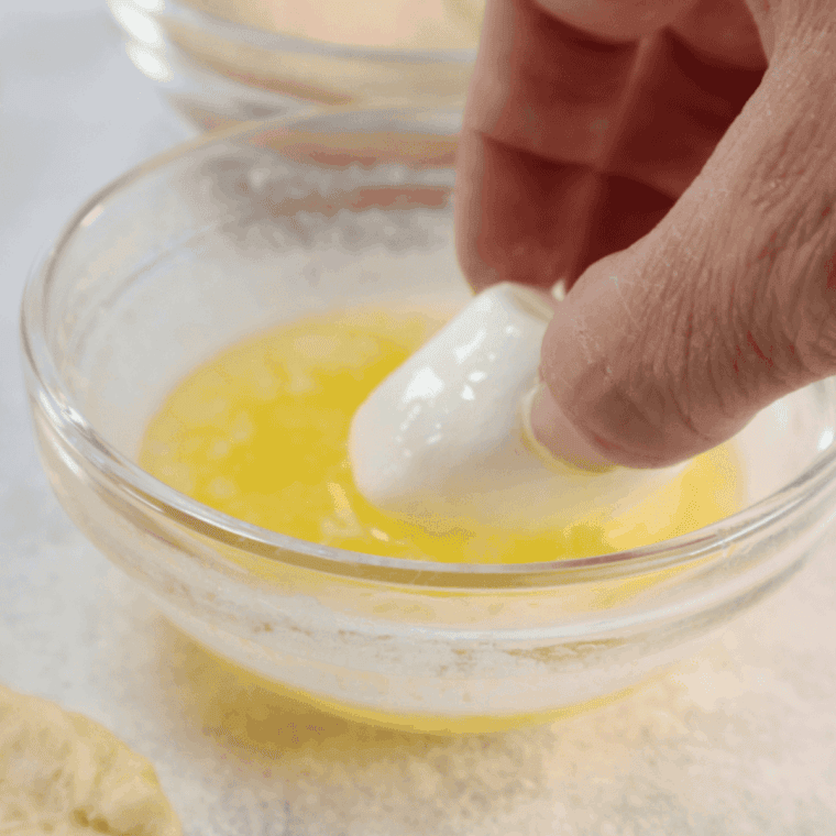 Dip into the melted butter.