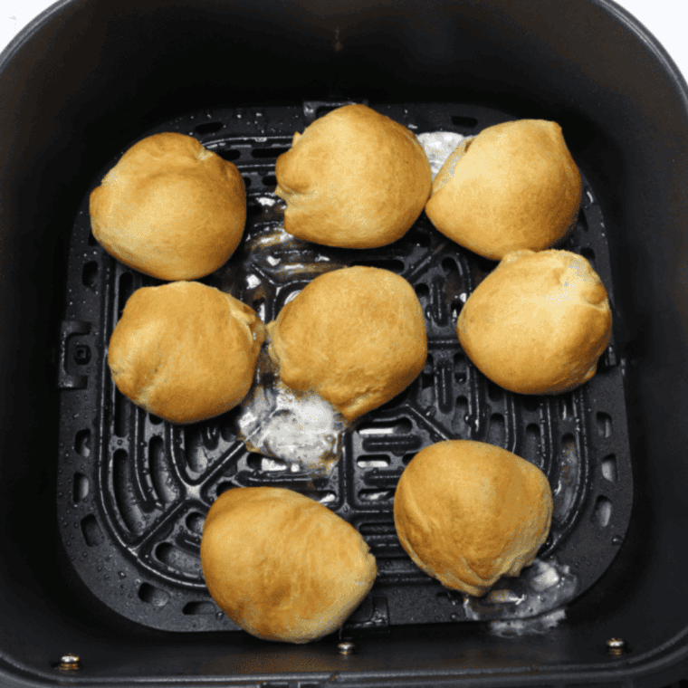 Crescent buns brushed with melted butter and topped with cinnamon sugar before air frying