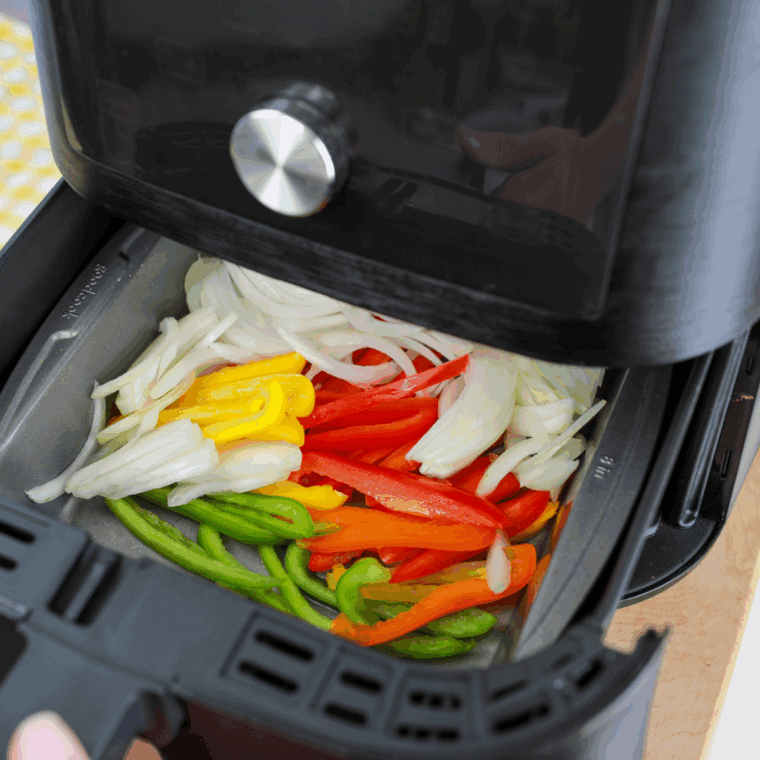 Place vegetables into the air fryer basket.