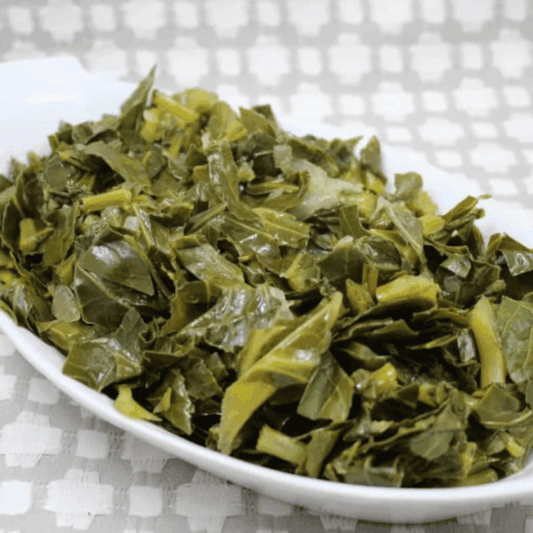 Golden Corral style collard greens in a bowl, showing their tender texture and smoky seasoning.