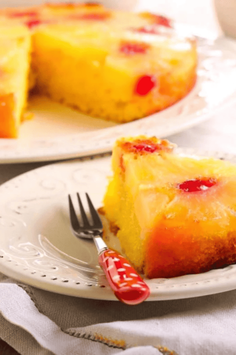 Slice of Instant Pot Pineapple Upside Down Cake with caramelized pineapple and brown sugar topping