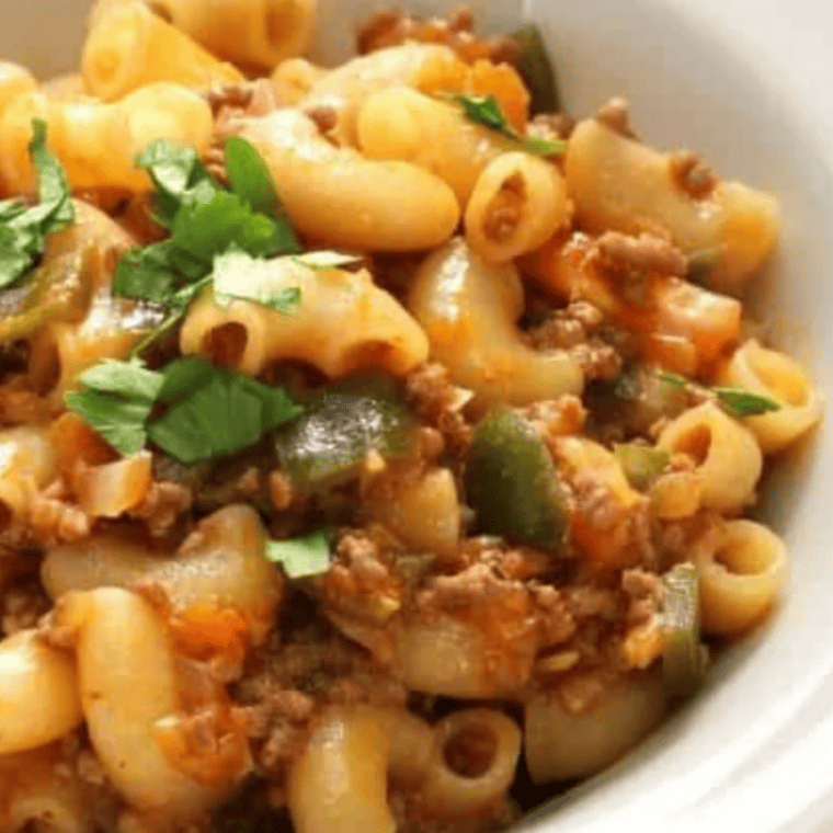 Homemade Hamburger Helper in Instant Pot with beef, pasta, and melted cheese sauce
