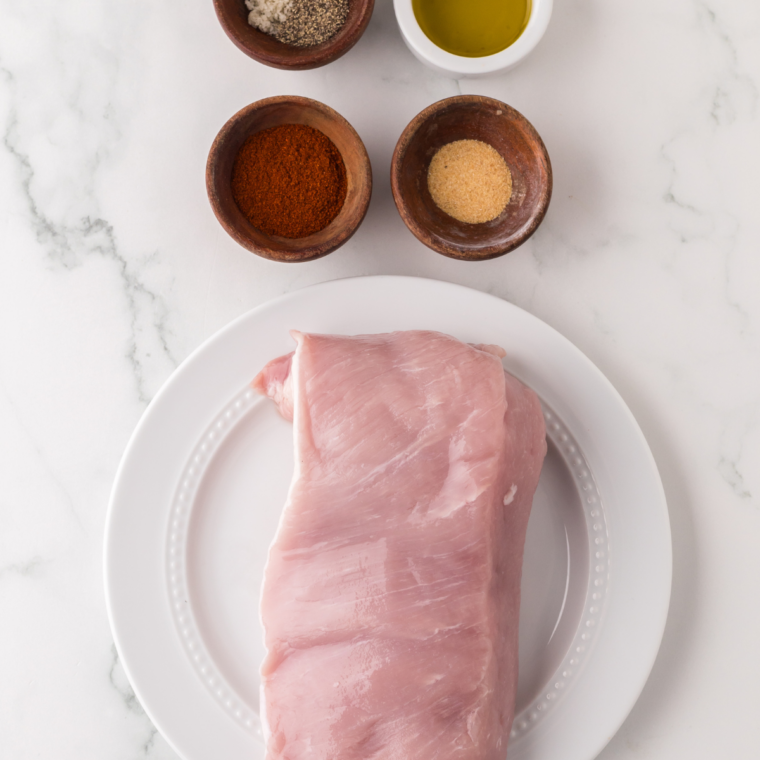 Ingredients needed for Marinated Pork Tenderloin in Air Fryer on kitchen table.