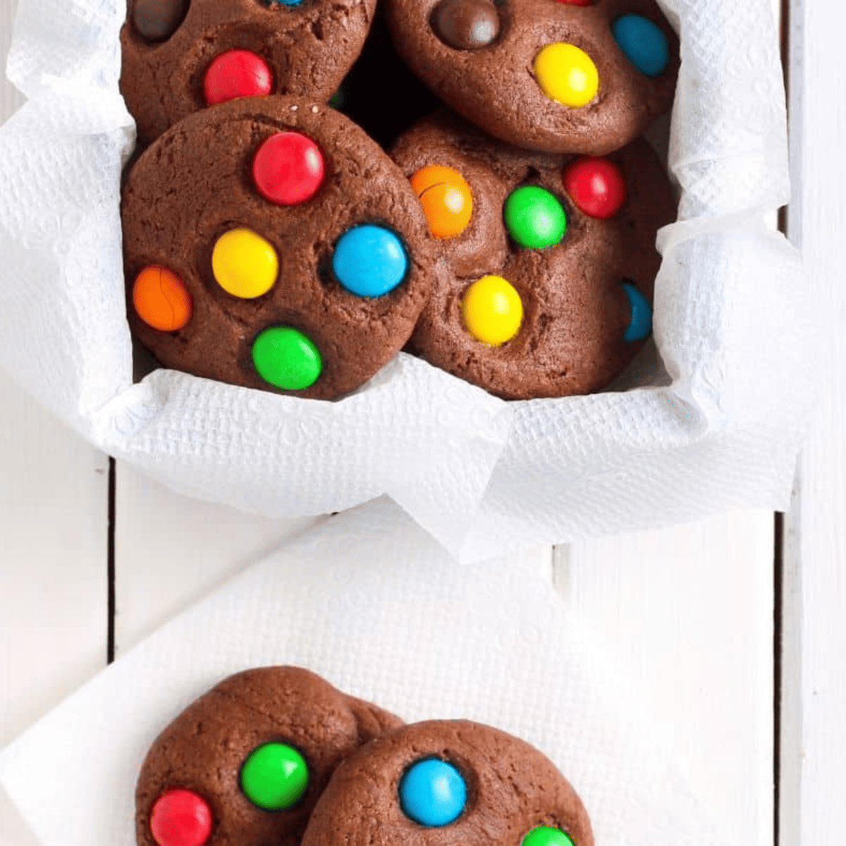Air fryer Christmas brownie mix cookies, soft, fudgy, and decorated for the holidays on a plate