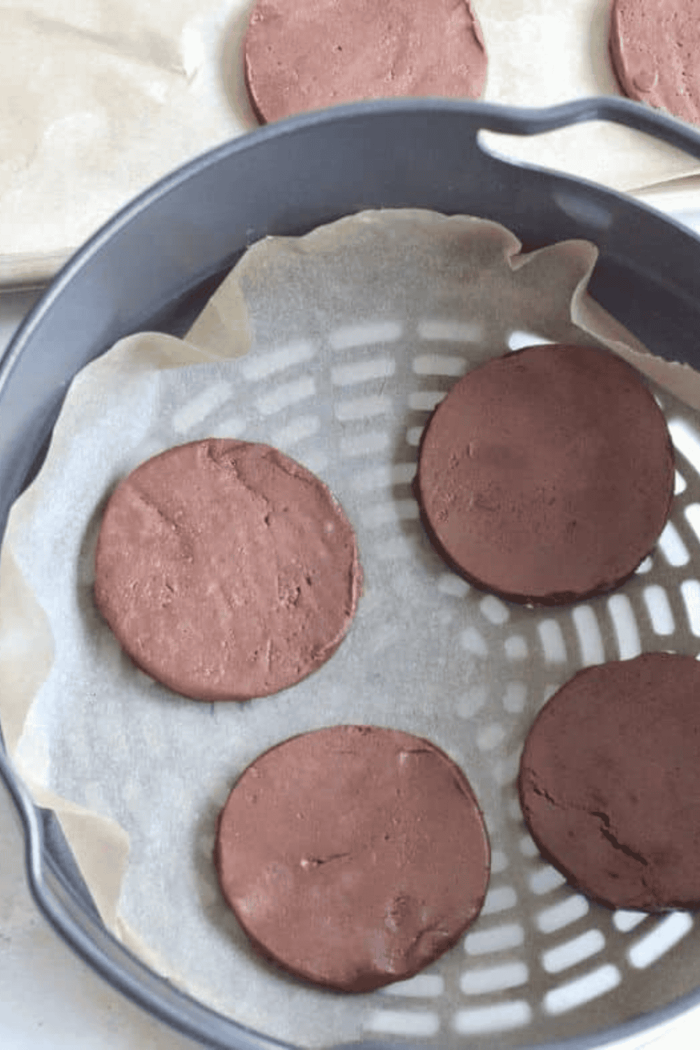 Remove chilled dough, preheat air fryer, roll and cut cookies
