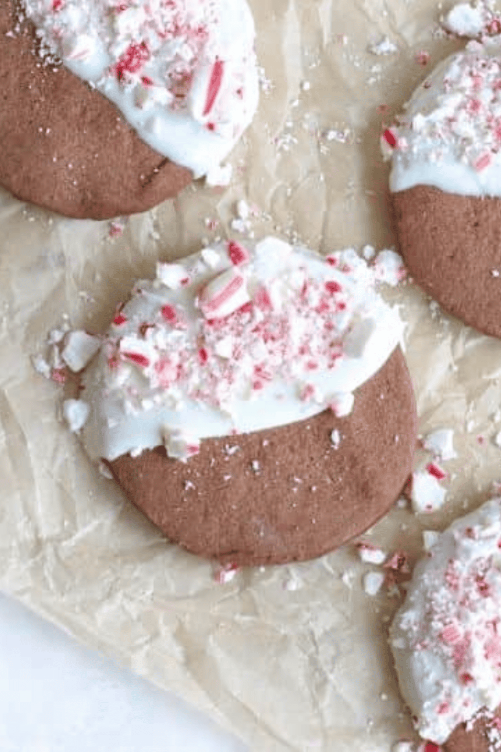 Air Fryer Dark Chocolate Peppermint Cookies topped with crushed candy canes on a cooling rack, ready to serve.