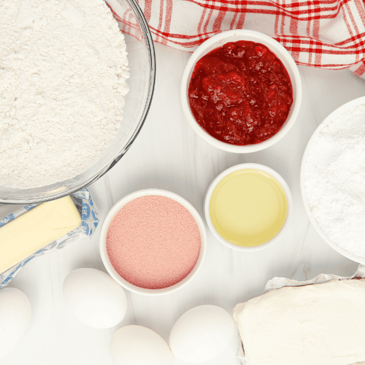 Ingredients needed for Air Fryer Valentine Cupcakes on kitchen table.