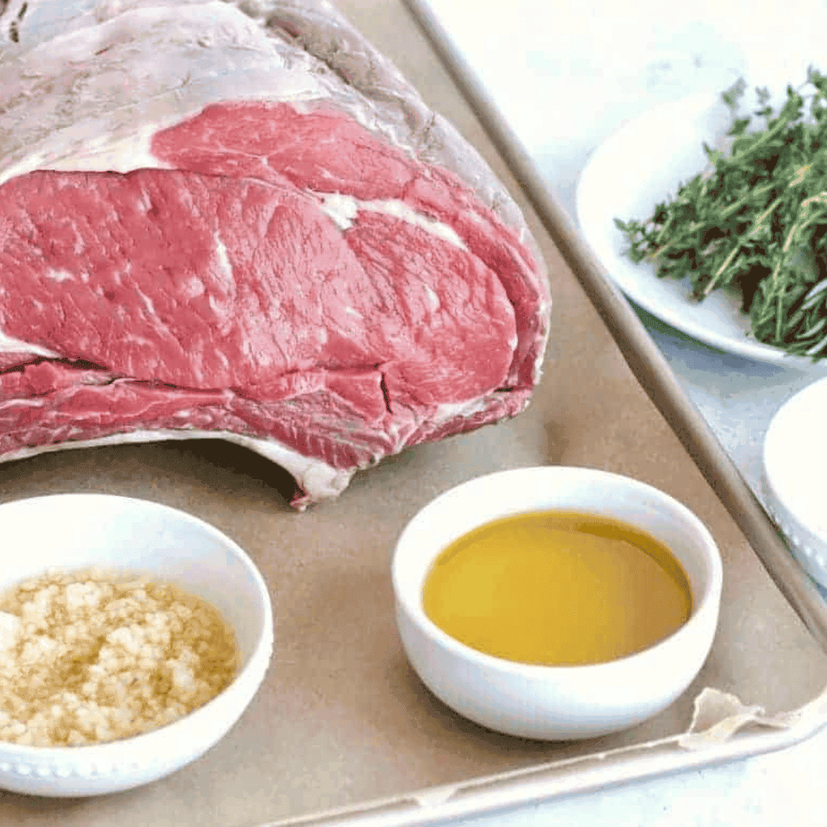 Ingredients needed for Air Fryer Prime Rib on kitchen table.