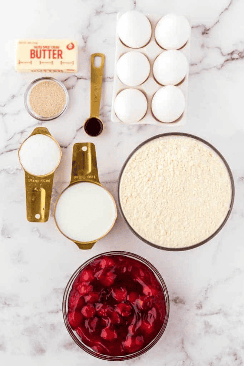 Ingredients needed for Air Fryer Cherry Pie Donuts on kitchen table.