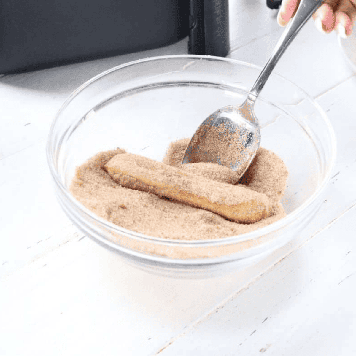 Golden brown crispy churros fresh out of the air fryer basket