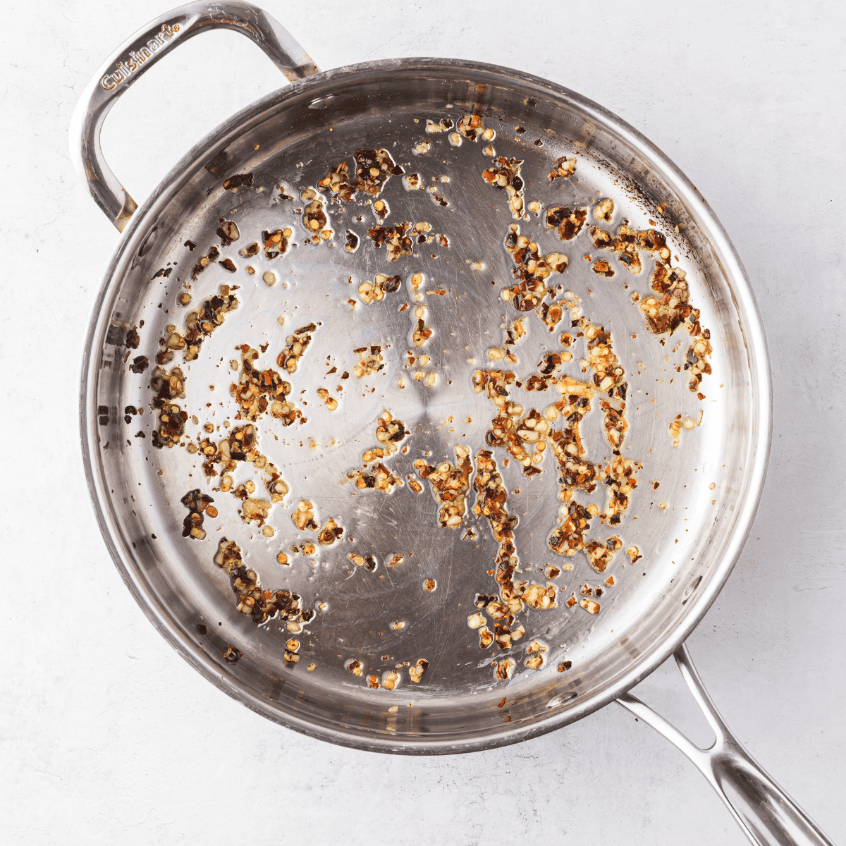 Sauté chopped garlic and onion in olive oil until fragrant and translucent in a medium saucepan.