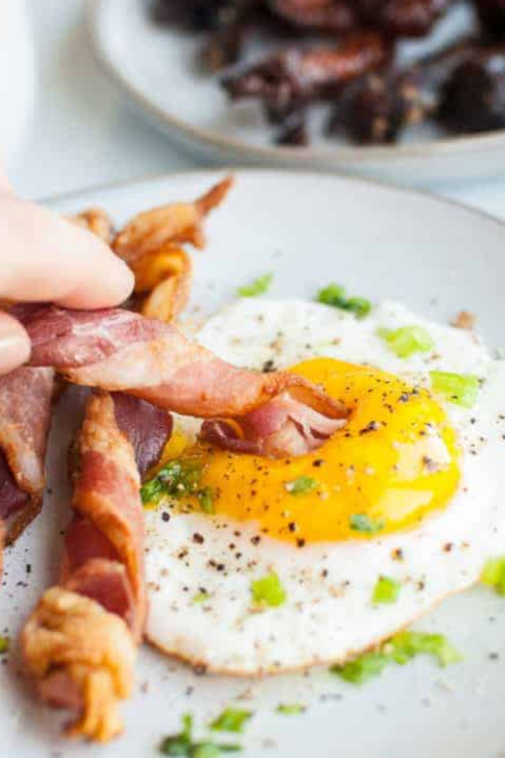 Air fryer twisted bacon spiraled and cooked until crispy golden brown with caramelized edges for a viral TikTok bacon hack that improves texture and flavor