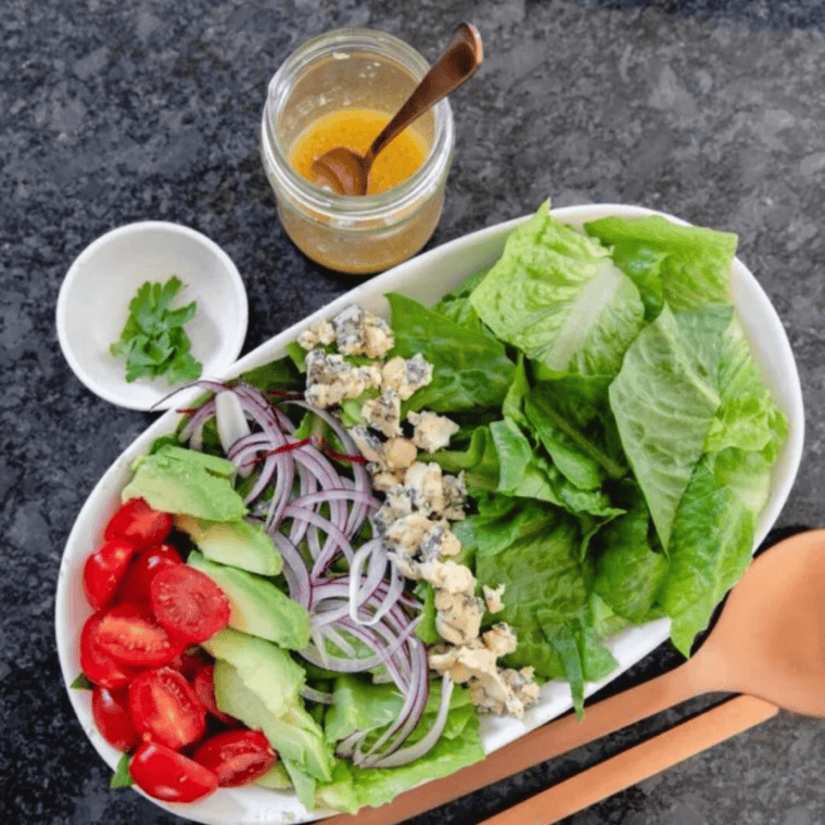 Red wine vinaigrette ingredients in a jar for Cobb salad dressing