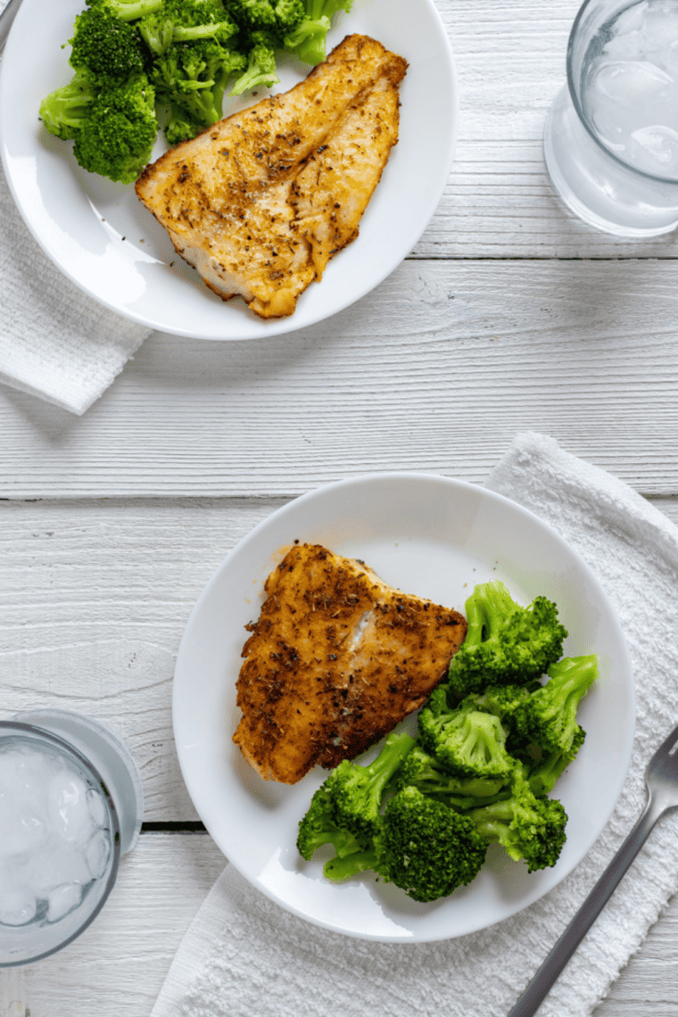 Air fryer swai fish fillets cooked without breading until tender and flaky served as a healthy easy dinner plate