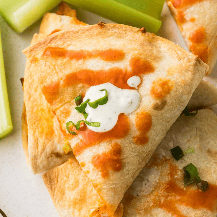 Air fryer Southwest chicken quesadilla made with melted cheese, seasoned chicken, and golden crispy tortilla.